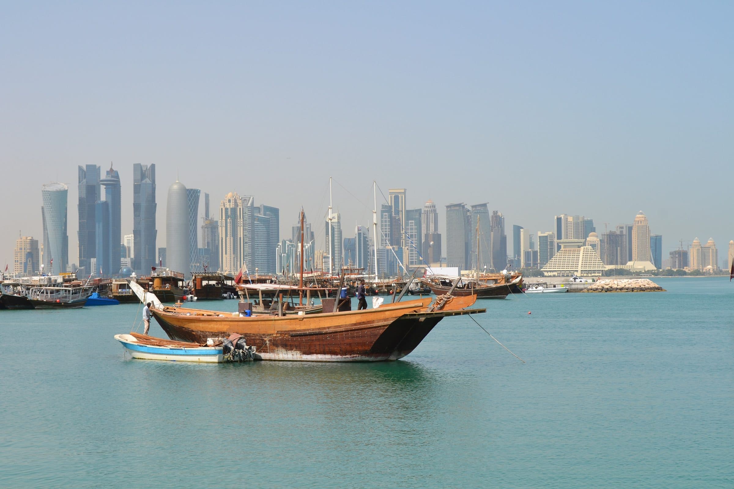 Doha skyline and a traditional dhow